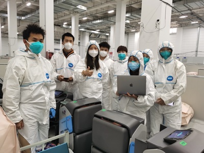 臨港方艙紀(jì)實(shí) 大白小白協(xié)同上陣，數(shù)字戰(zhàn)“疫”科技守“滬”